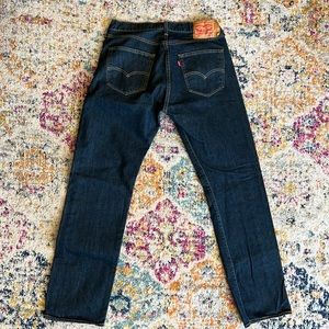 Levi’s 501’s, dark wash.  Never been worn.  33x32. Excellent condition.